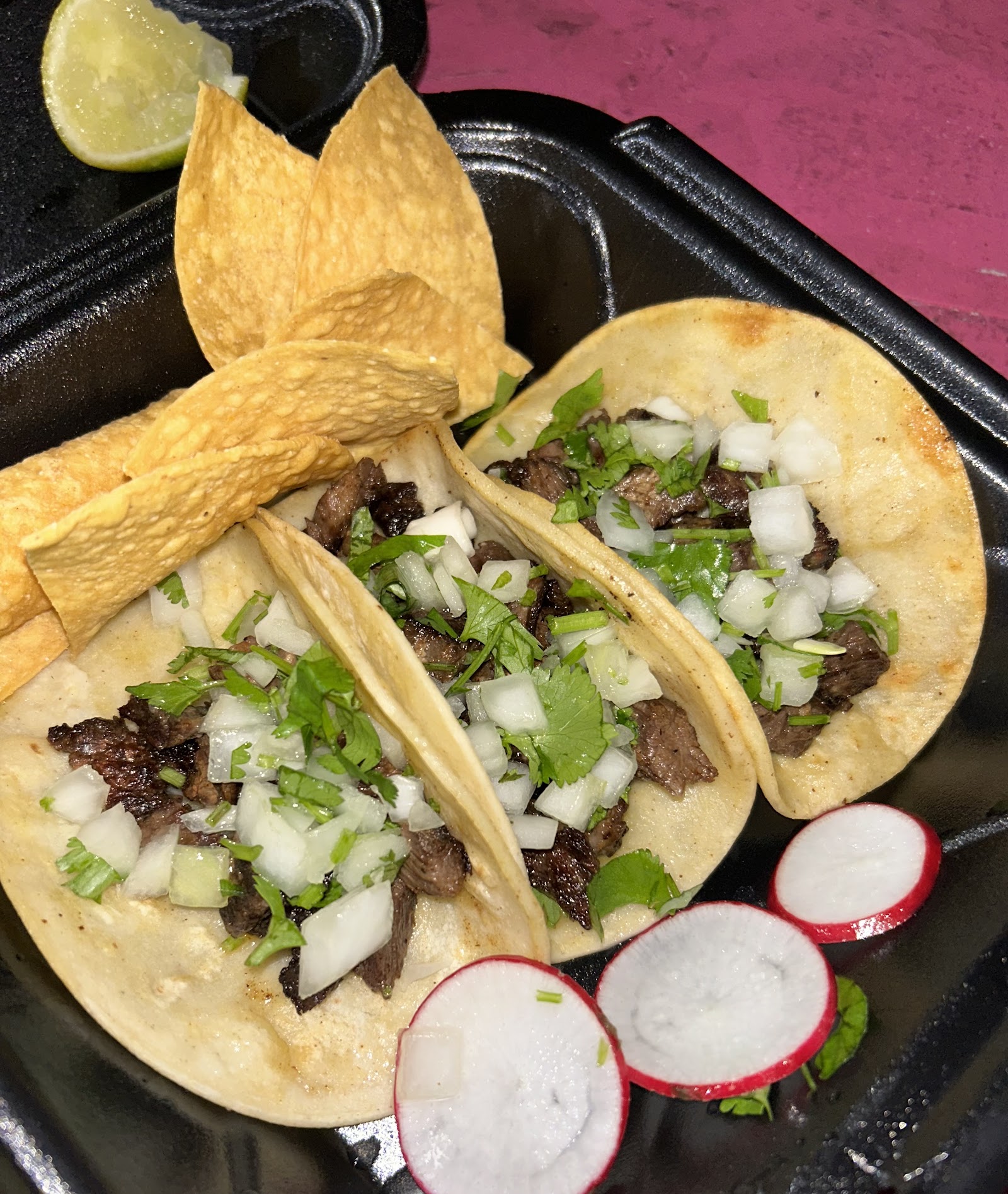 Three tacos photographed for Twice Miami
